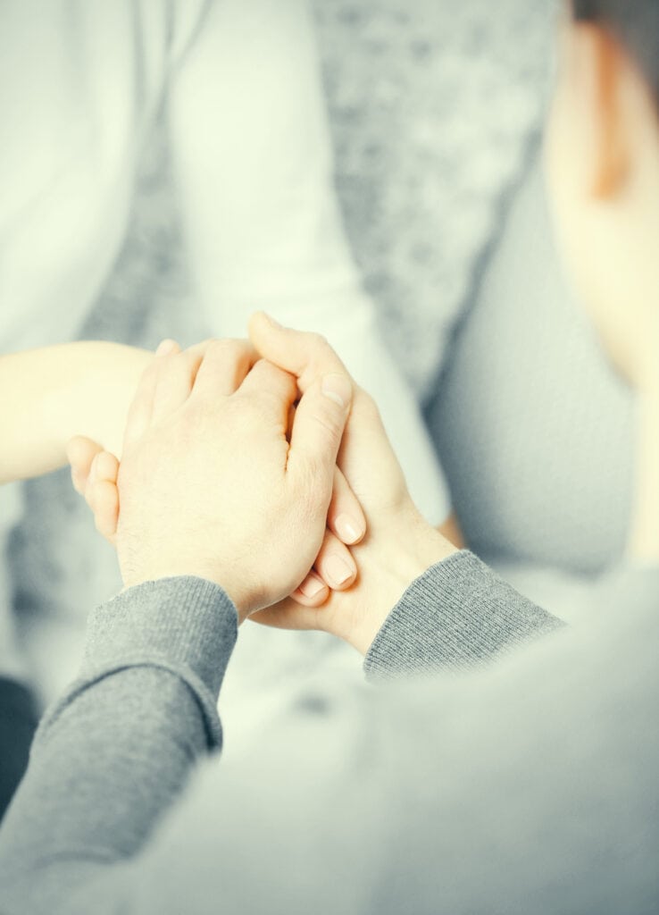 holding hands at addiction Treatment Programs near boston