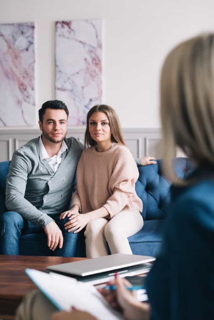 couple getting information about addiction treatment programs